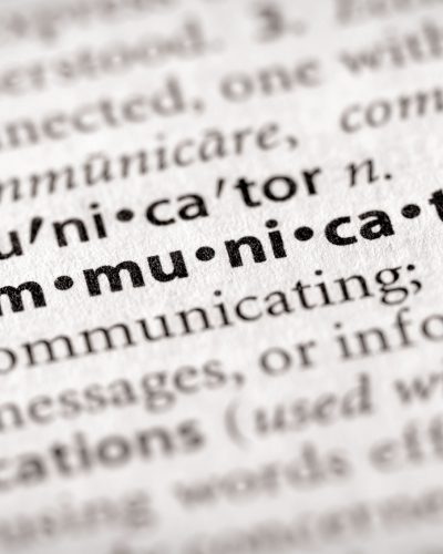 photo of dictionary looking up communication