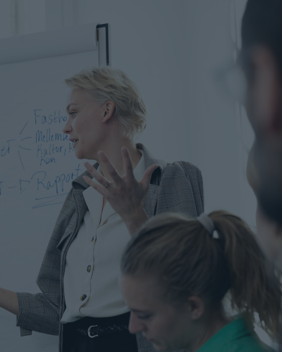 Women presenting to audience